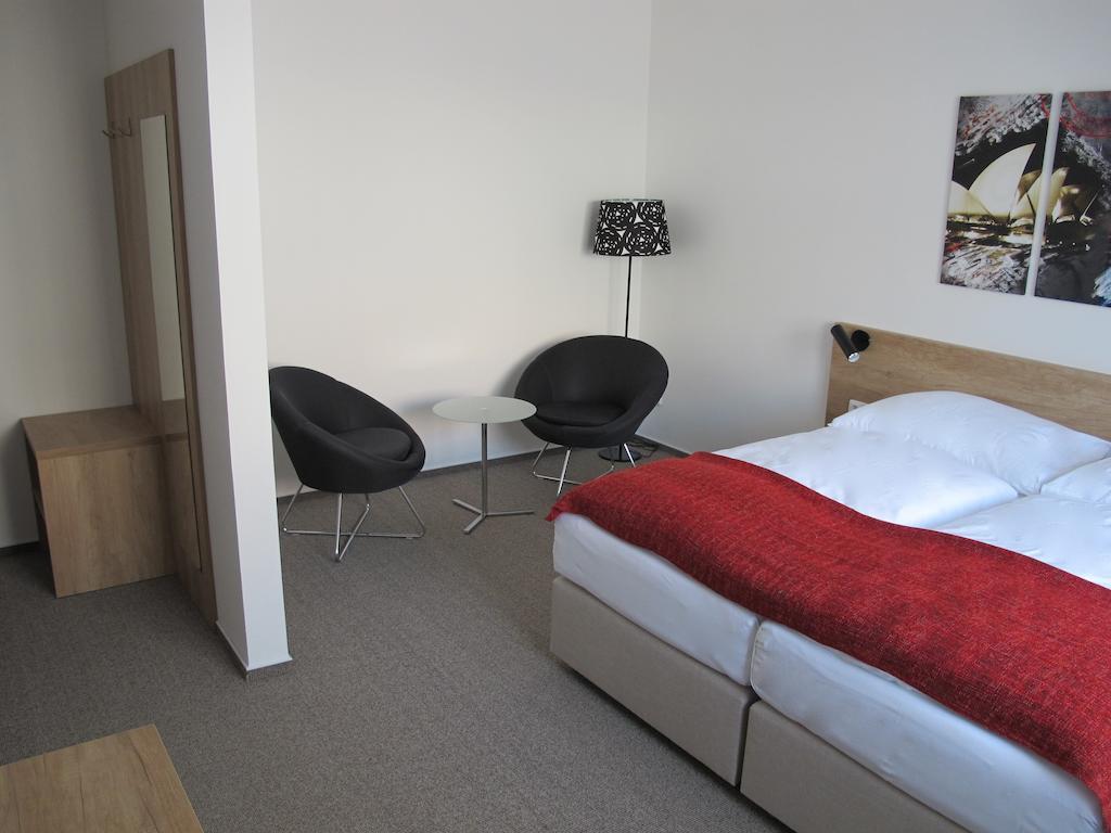Hotel Kapitol Most Quarto foto