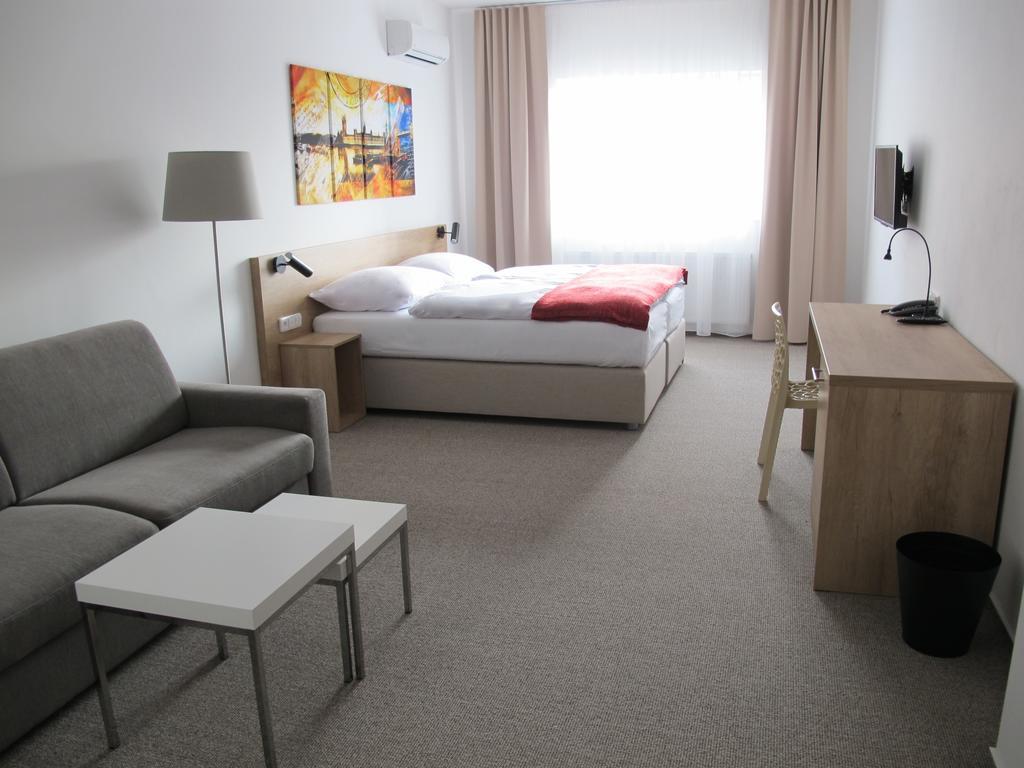 Hotel Kapitol Most Quarto foto